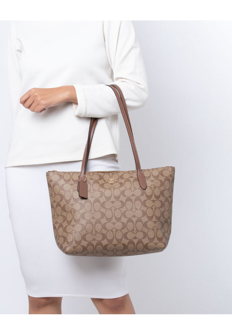 Coach Zip Top Tote In Signature Canvas - Brown