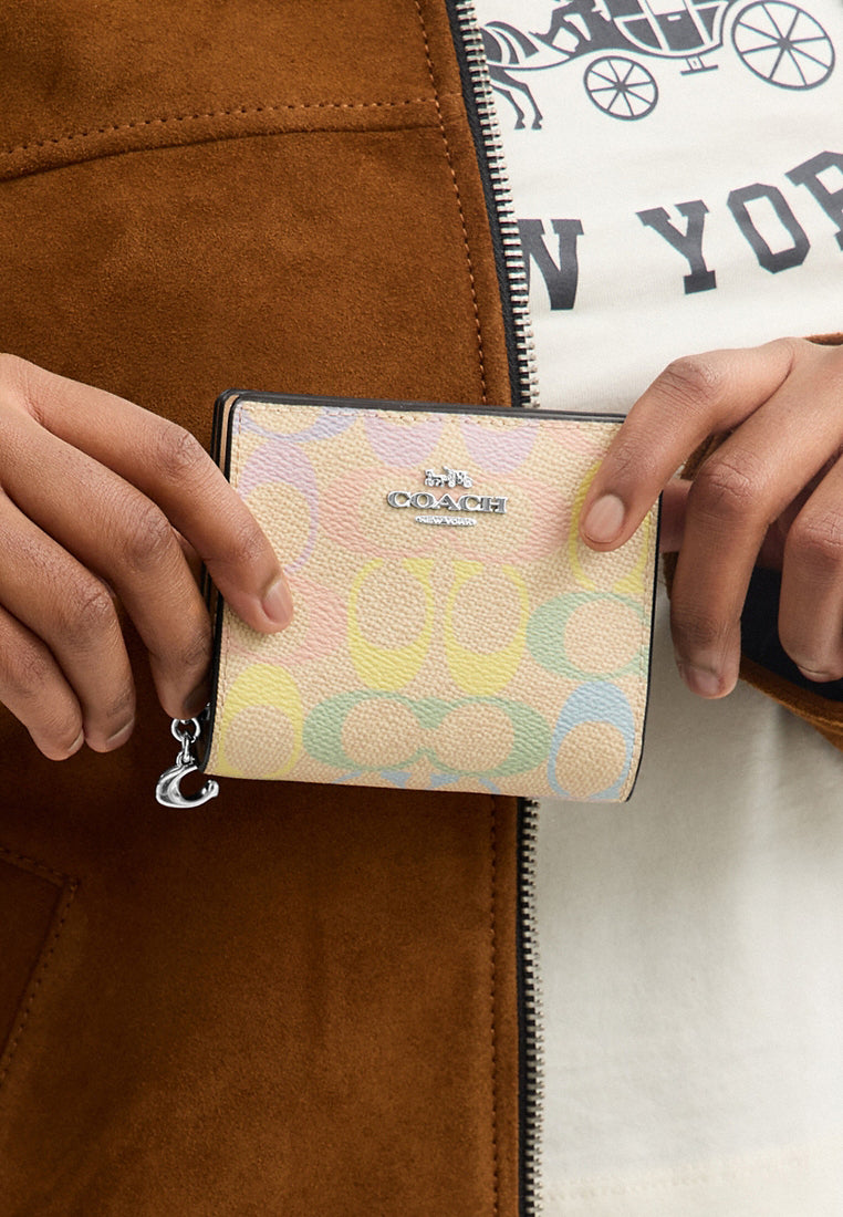 Coach Snap Wallet In Rainbow Signature Canvas - Sand/Multi