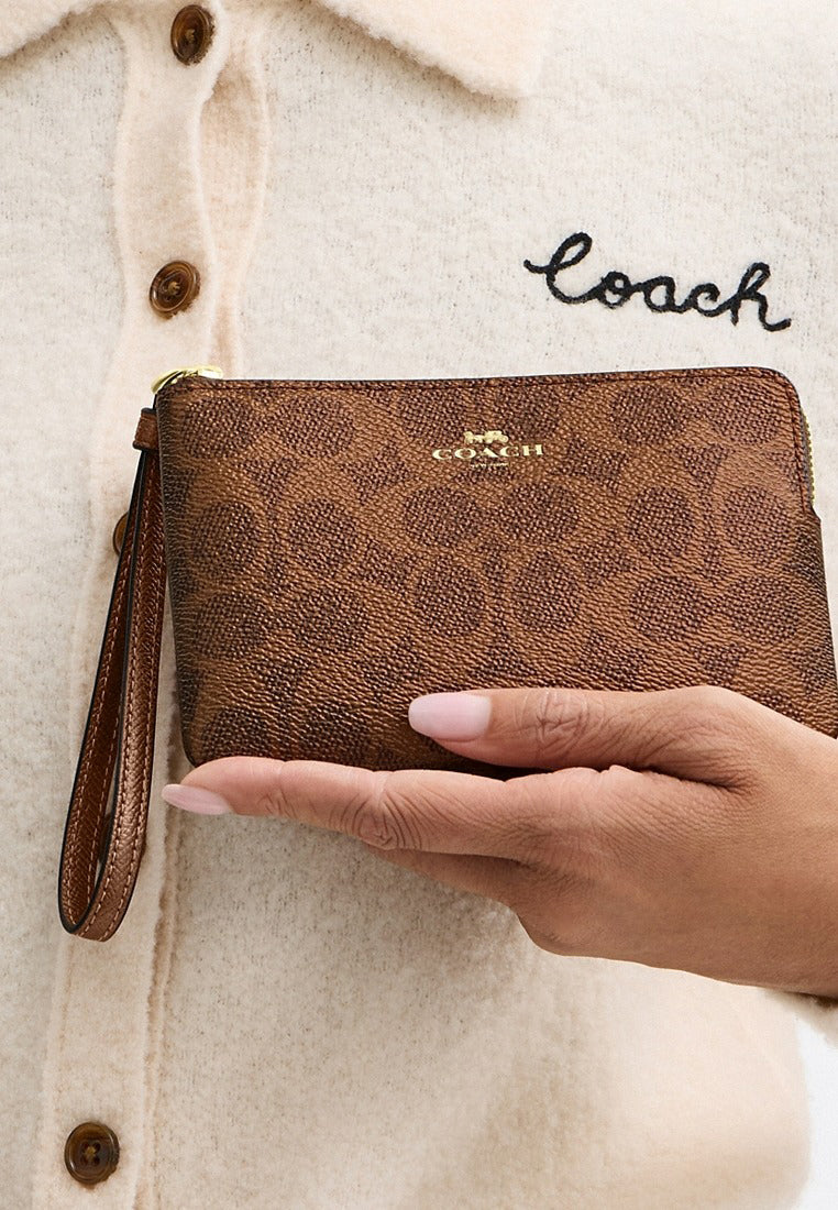 Coach Corner Zip Wristlet In Signature Canvas - Brown/Copper