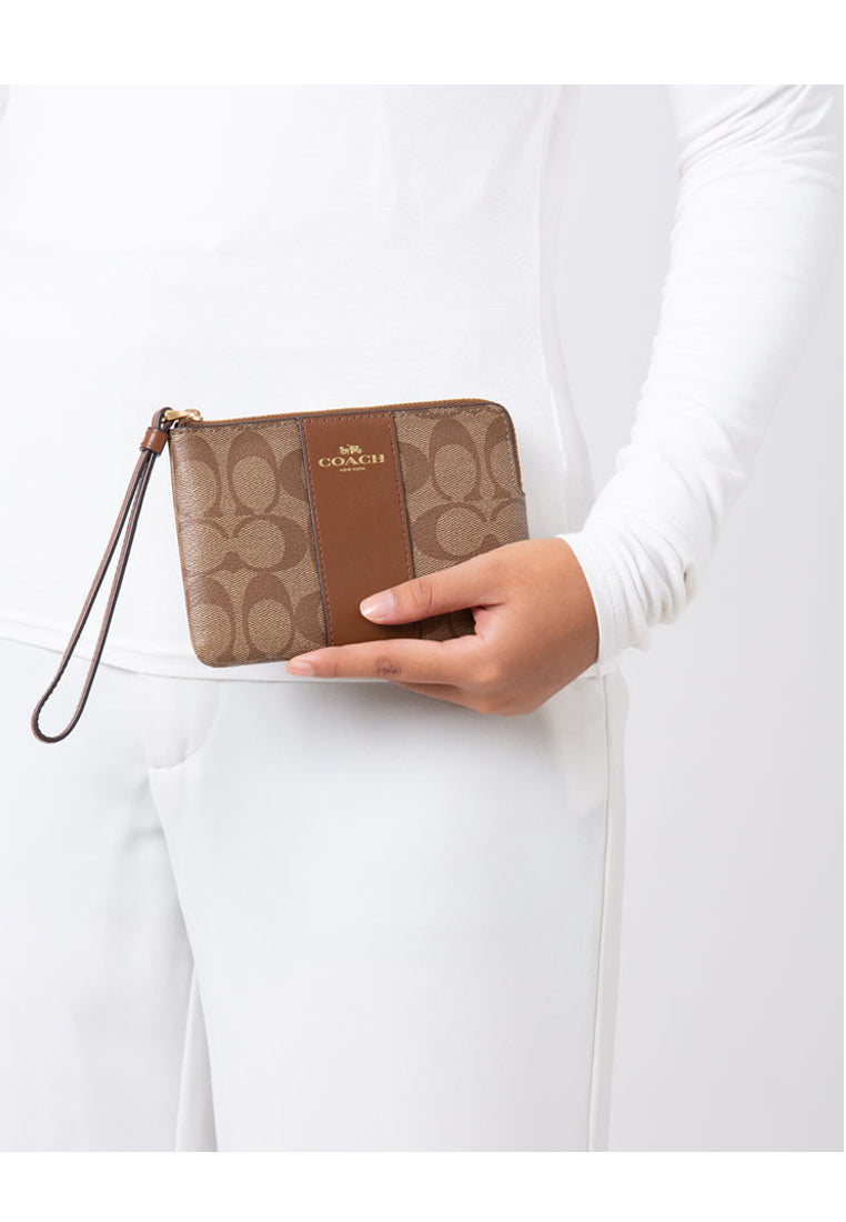 Coach Corner Zip Wristlet In Signature Canvas - Brown