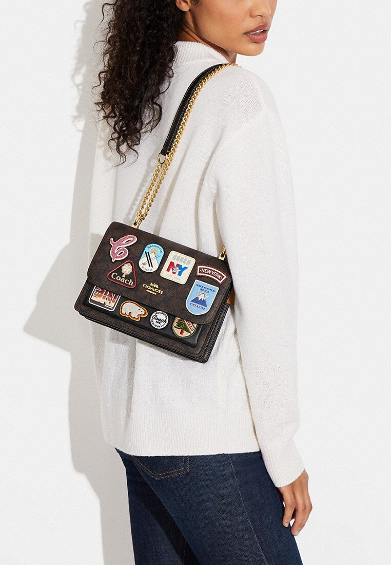 Coach Klare Crossbody in Signature Canvas With Ski Patches - Brown