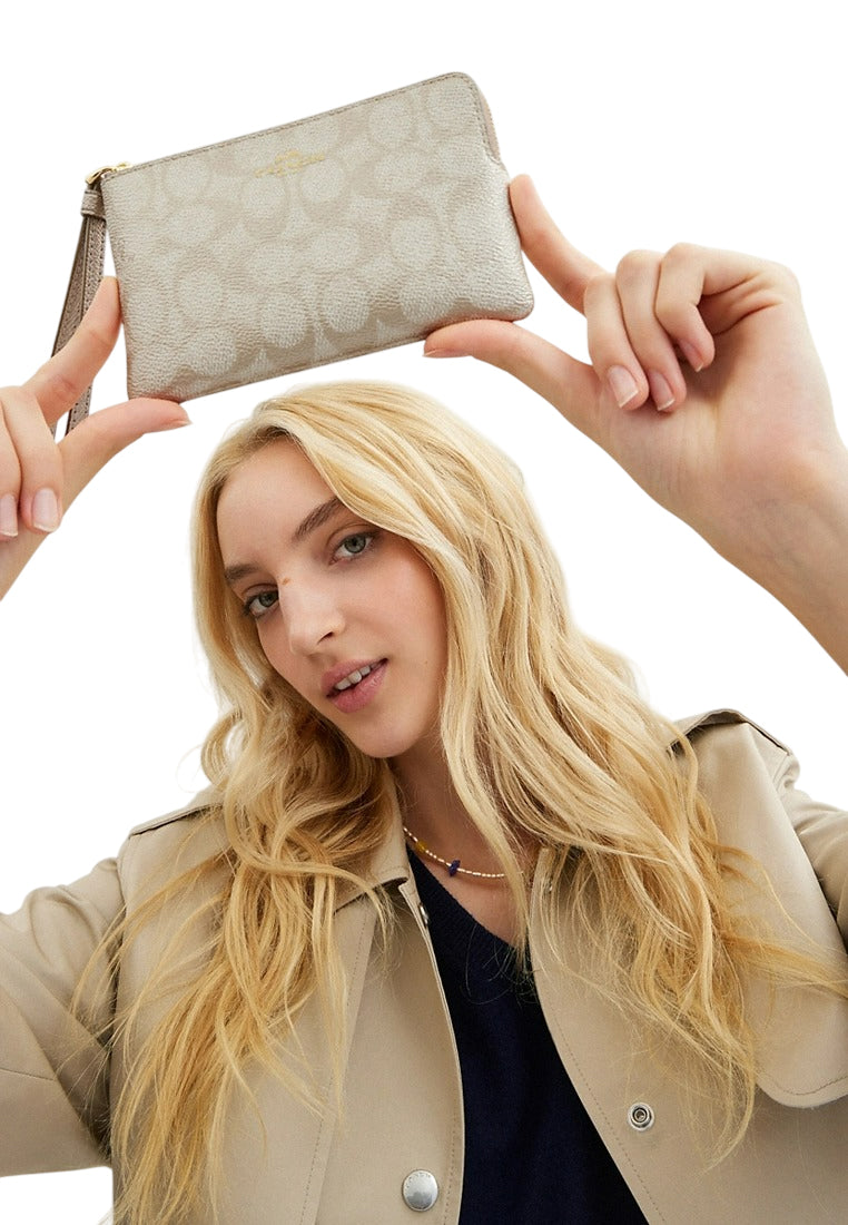 Coach Corner Zip Wristlet In Signature Canvas - Champagne
